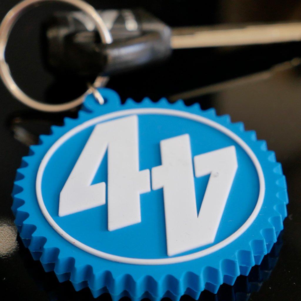 44T merchandise blue keyring with white logo